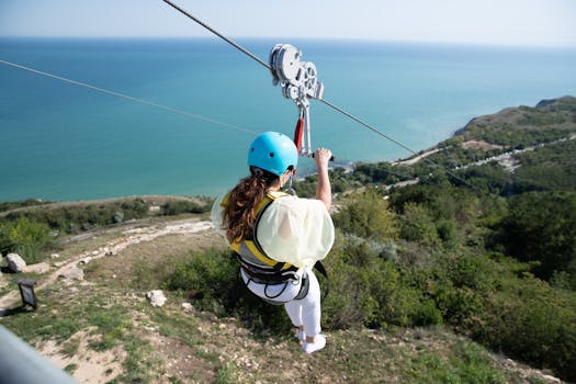 pexels-photo-6454835-6454835 Experience the thrill of ziplining over a scenic Bulgarian landscape with breathtaking sea views.